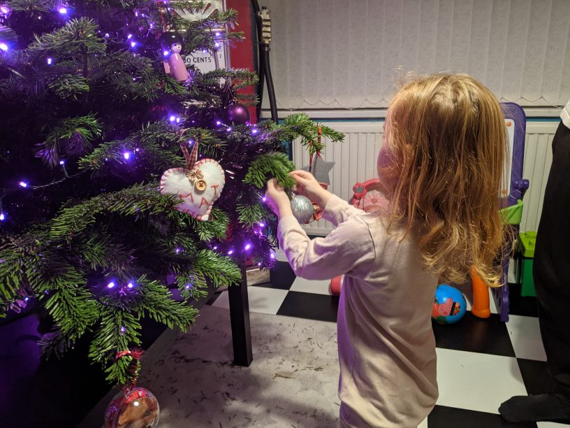 Lara adding baubles